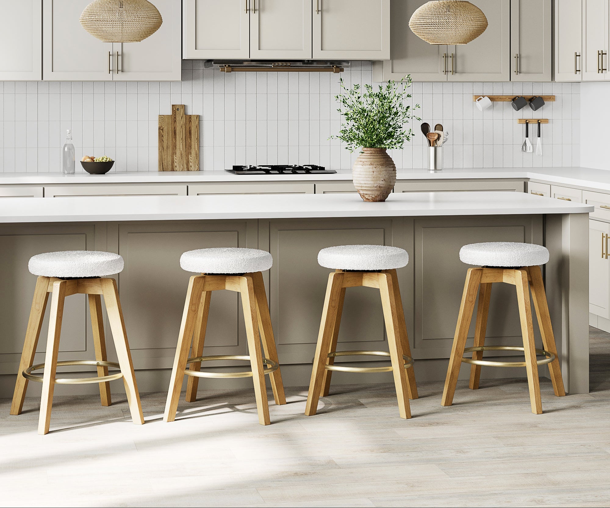 Modern kitchen with light wood stools and white island